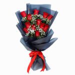 Designer Bouquet of 12 Red Roses in a black wrapping in JuneFlowers.com