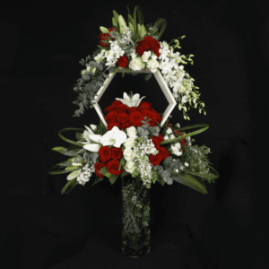 Christmas Bouquet - Signature Arrangement in a vase | Order Now at Juneflowers.com