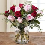A beautiful Combination of Red and Light Pink Roses with Vase Cylinder from JuneFlowers.com
