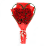 Romantic Red roses in a red wrapping sheet from JuneFlowers.com