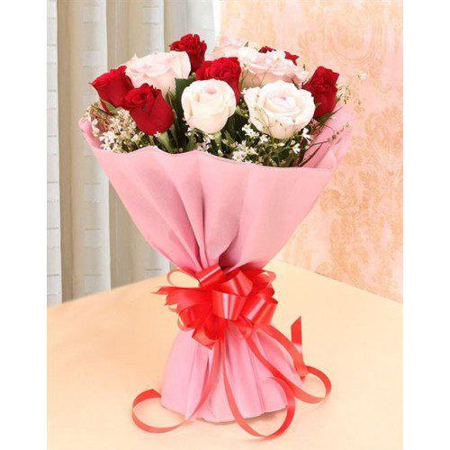 Glamarous Love "Beautiful 3 Red Roses and 3 White Roses in a pink paper packing with a red ribbon bow from JuneFlowers.com"