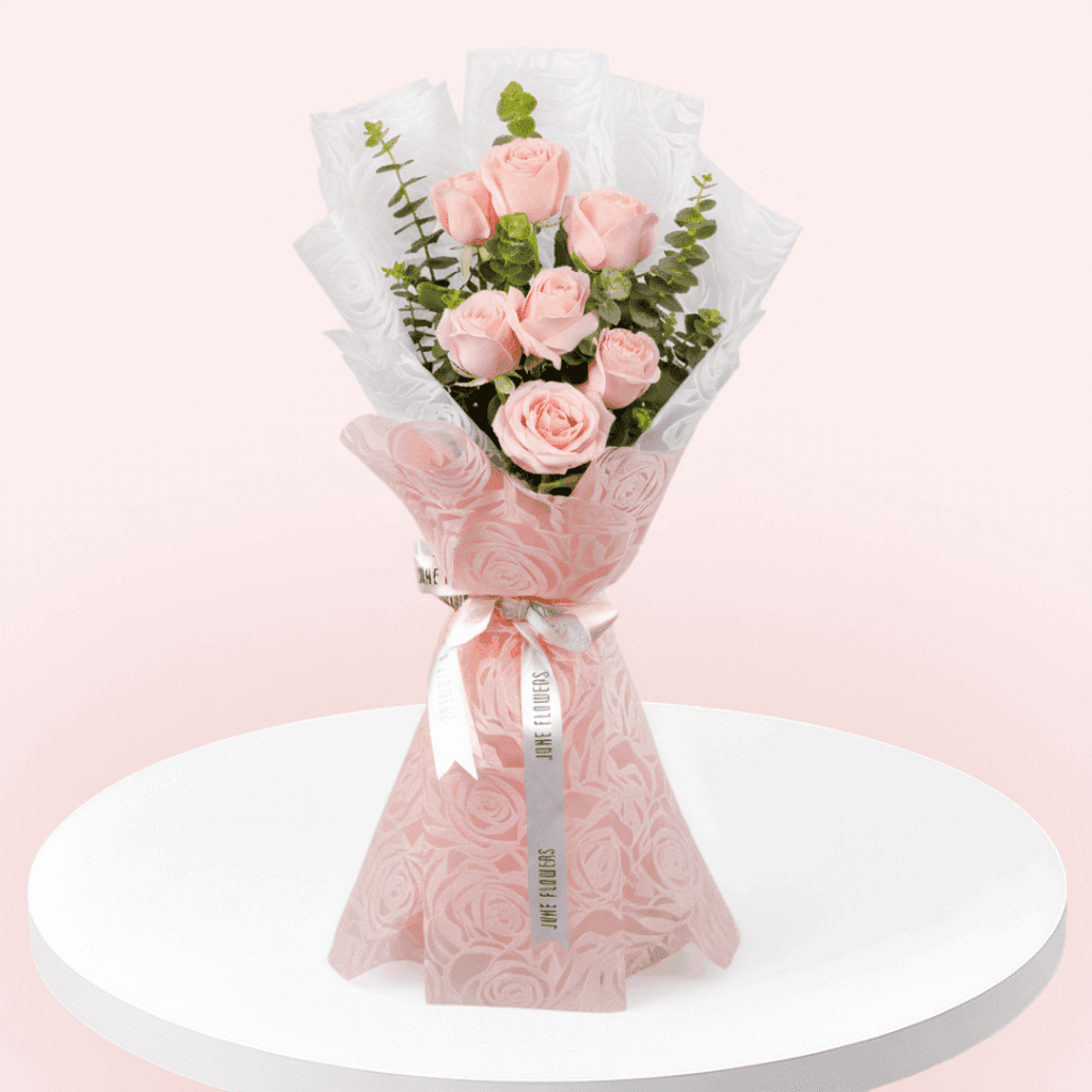 Pink roses and eucalyptus bouquet in Korean floral wrapping sheets