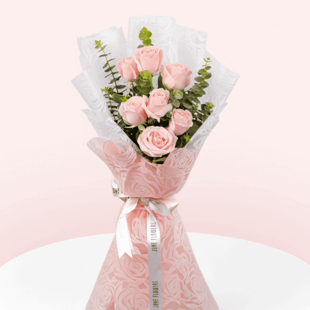 Pink roses and eucalyptus bouquet in Korean floral wrapping sheets