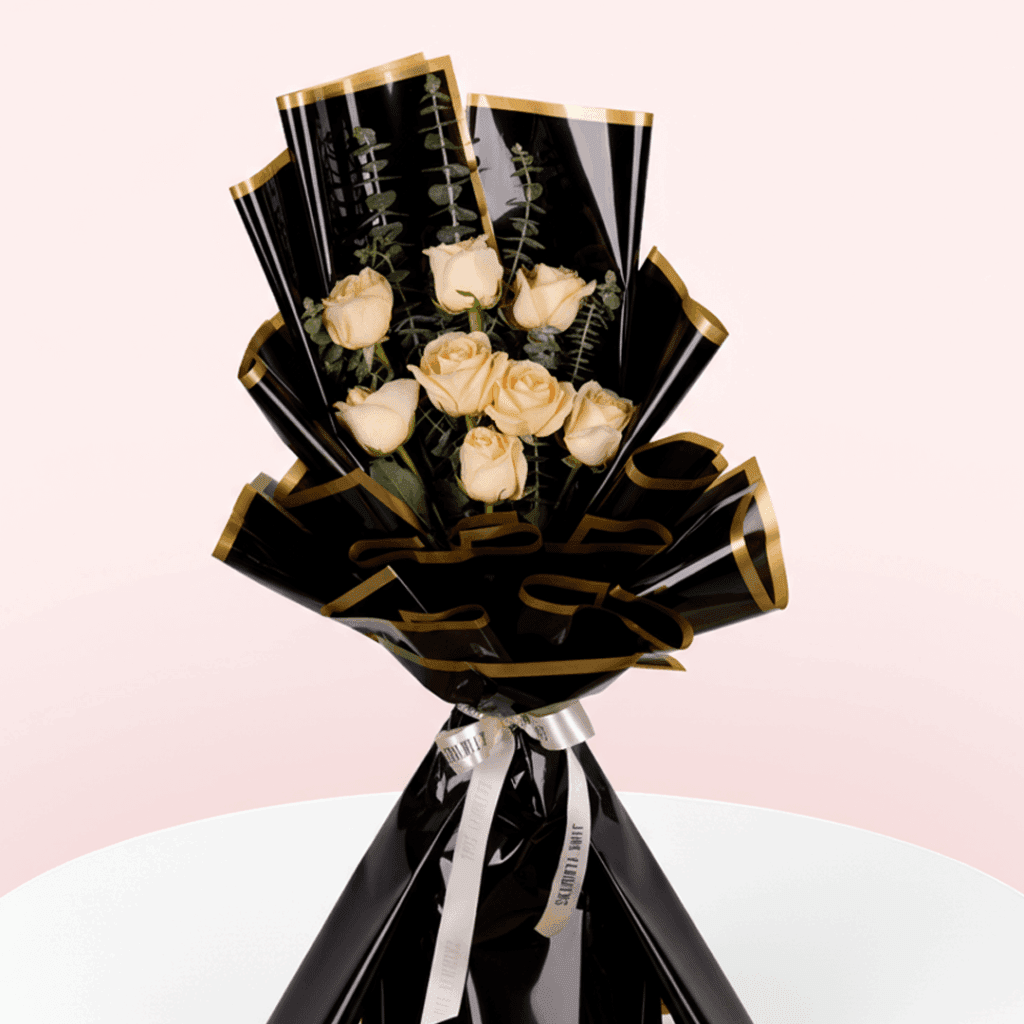 Order a bouquet of peach roses and eucalyptus in Korean-style black floral wrapping