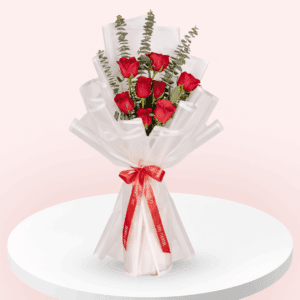 Elegant handtied red rose bouquet with eucalyptus and Korean-style sheets