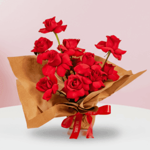 Fresh red roses bouquet arranged in oasis sponge wrap.