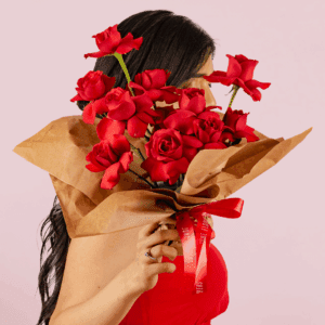 Fresh red roses bouquet arranged in oasis sponge wrap.